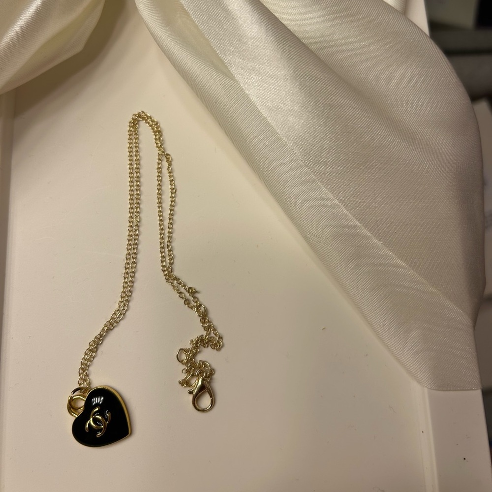 CHANEL Gold and Black Heart Necklace